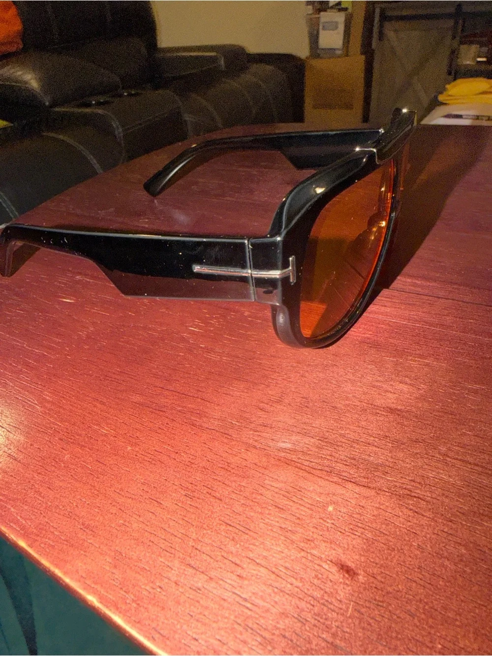 Tom Ford Black Frame Sunglasses with Orange Lenses